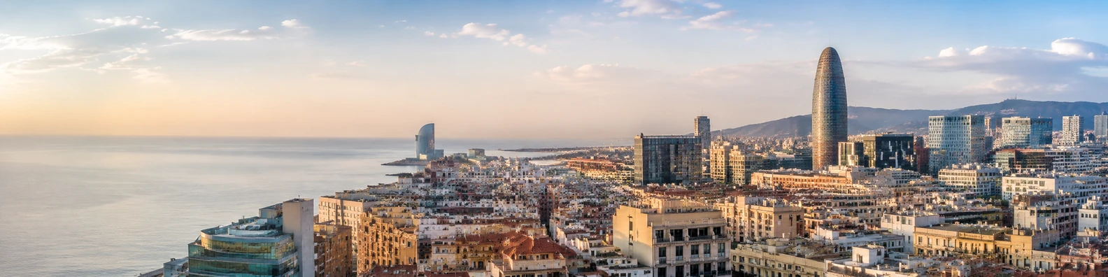 Barcelona urban skyline with coastal atmosphere and warm Mediterranean light LinkedIn banner