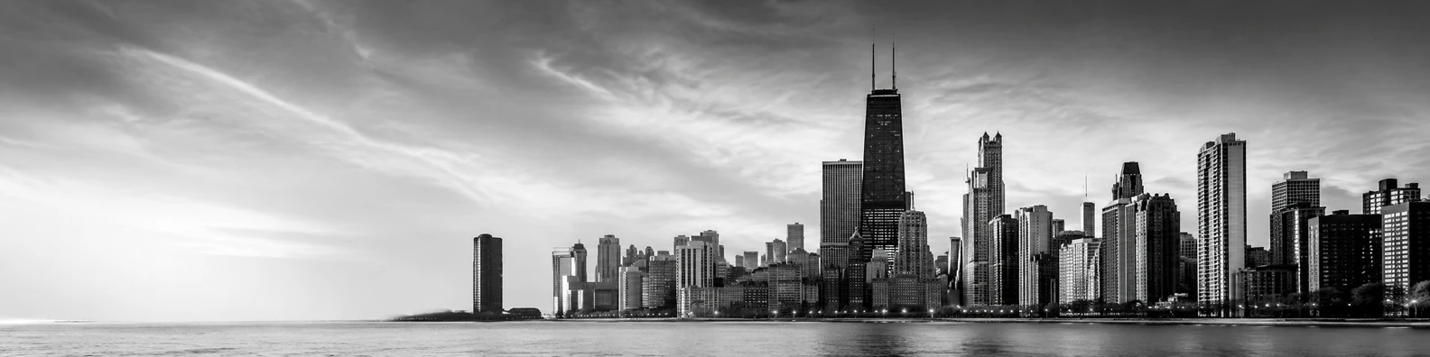 Black and white city skyline with skyscrapers, clean contrast, and professional monochrome style LinkedIn banner