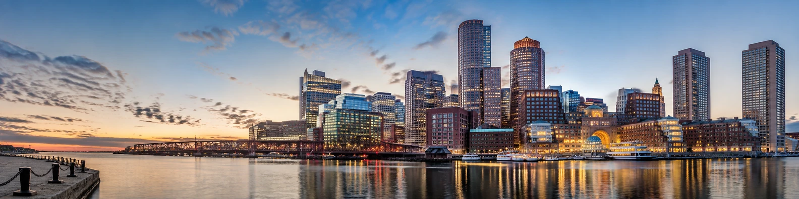 Boston skyline harbor view with water reflections and soft evening light LinkedIn background banner