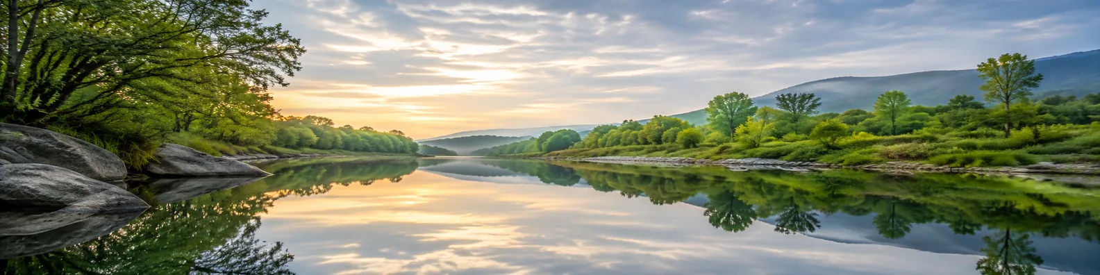 Calm river reflection LinkedIn background banner with still water, mirrored trees, sky, clouds, and soft golden light