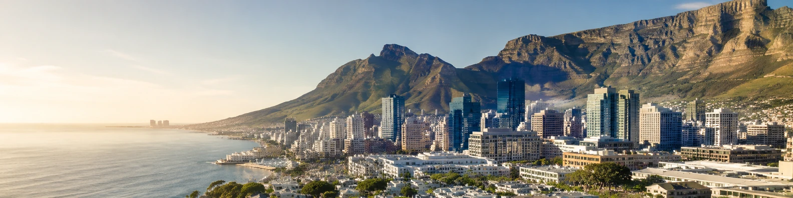 Cape Town city skyline with mountain backdrop, coastal view, and warm sunlight LinkedIn banner