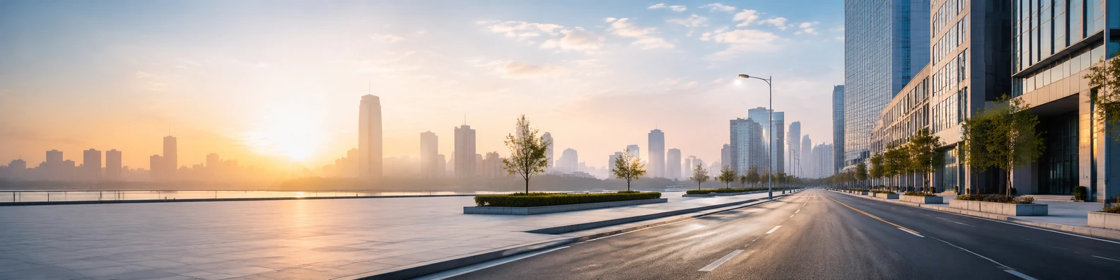 Empty city street morning with clean road lines, modern buildings, and soft sunrise light LinkedIn banner