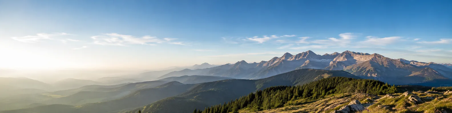 Faraway mountain view with soft haze and open sky LinkedIn background banner