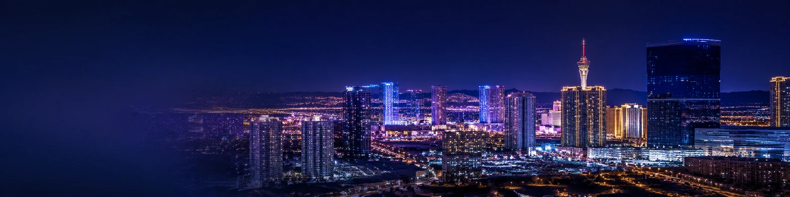 Las Vegas city lights with glowing buildings and polished night skyline LinkedIn background banner