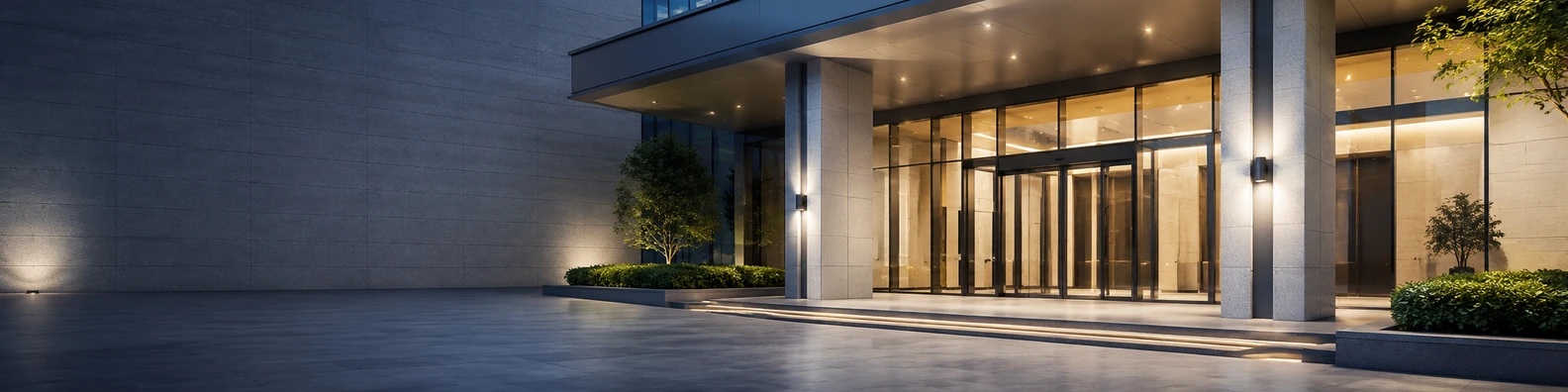 Modern building entrance with glass doors and architectural lines LinkedIn background banner