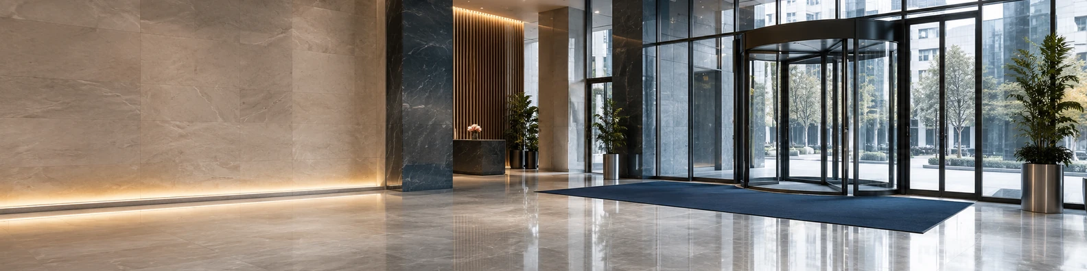 Modern building lobby entrance with glass doors and polished floors LinkedIn background banner
