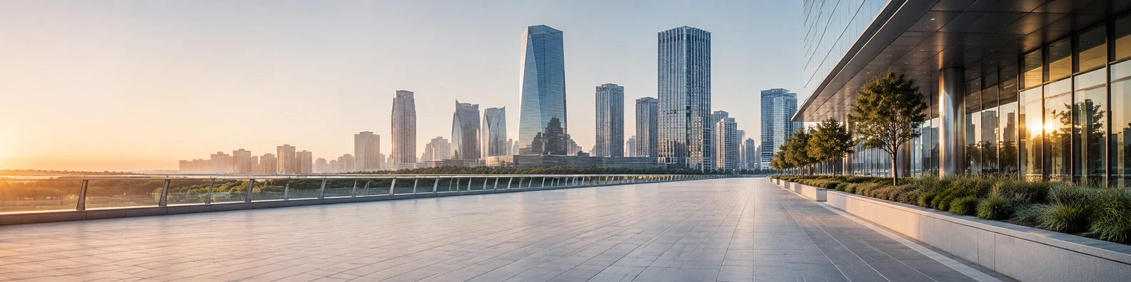 Modern city walkway with glass architecture, pedestrian path, and golden light LinkedIn banner