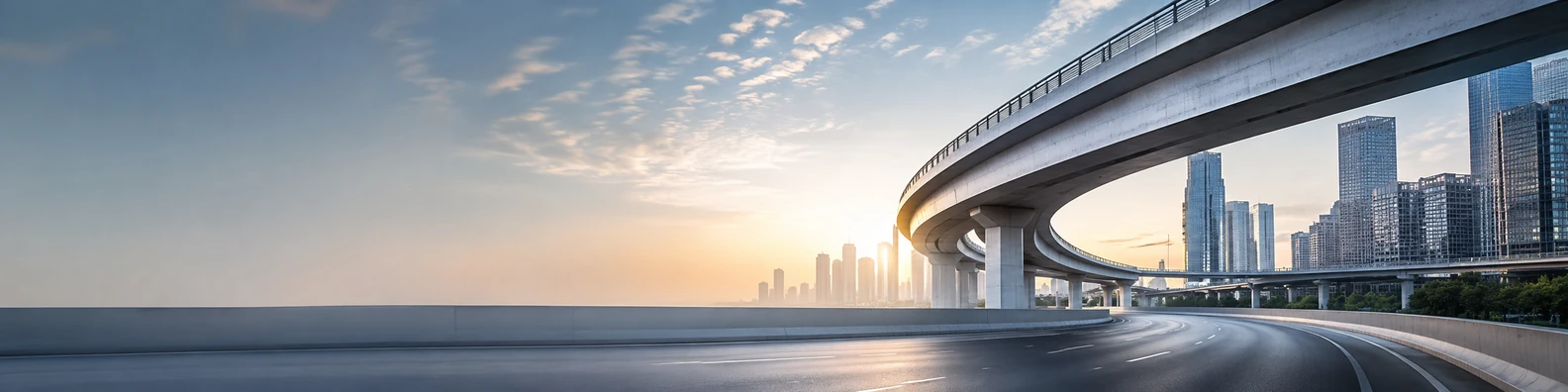 Modern overpass city view with road curves, concrete structure, and sunrise skyline LinkedIn banner