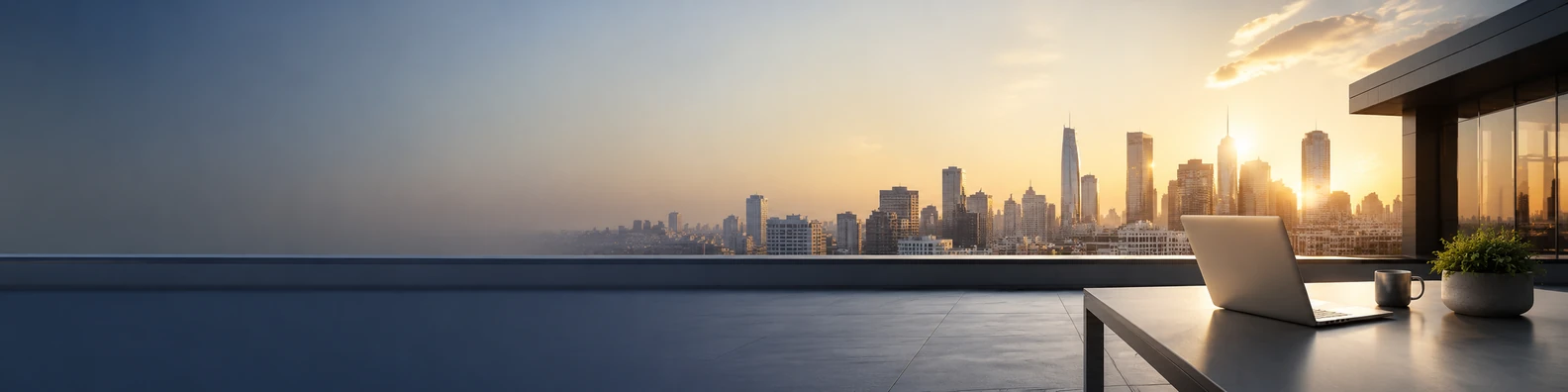 Urban rooftop workspace view with laptop, skyline, and warm sunrise light LinkedIn background banner