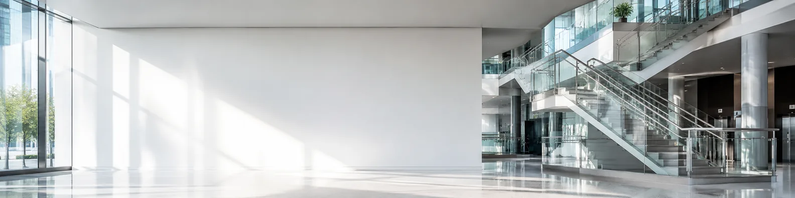 Modern building interior with glass staircase LinkedIn background banner
