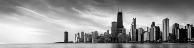 Black and white city skyline with skyscrapers, clean contrast, and professional monochrome style LinkedIn banner