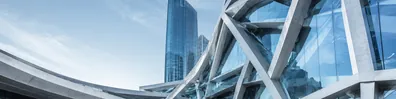 Modern urban architecture with intersecting glass and concrete structural lines LinkedIn background banner