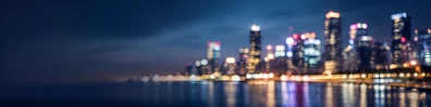 City lights bokeh background with softly blurred urban lights and evening atmosphere LinkedIn banner