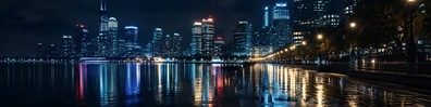 City night reflections with wet pavement, glowing buildings, and streetlights LinkedIn background banner