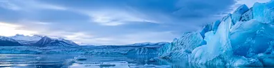 Glacial ice landscape with crystalline blue formations and cold reflective water LinkedIn background banner