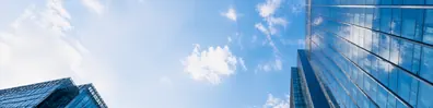 Glass buildings and blue sky urban LinkedIn background banner
