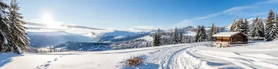 Bright snowy mountain landscape with winter tracks and alpine cabin LinkedIn background banner