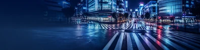Shibuya Crossing inspired urban view with crosswalk patterns, city lights, and motion blur LinkedIn banner