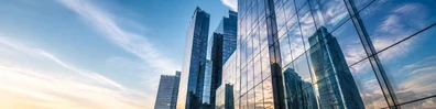 Urban glass tower reflection with tall skyscrapers and clean sky reflections LinkedIn banner