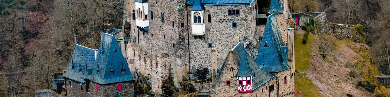 Castle At Mountain Base Background