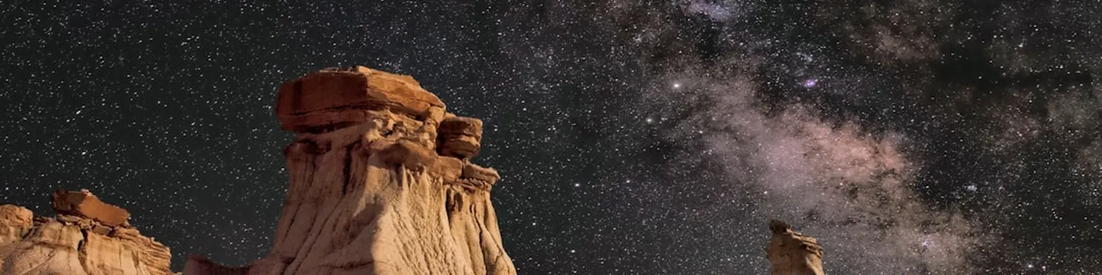 Night Stars Over Cliffs Background
