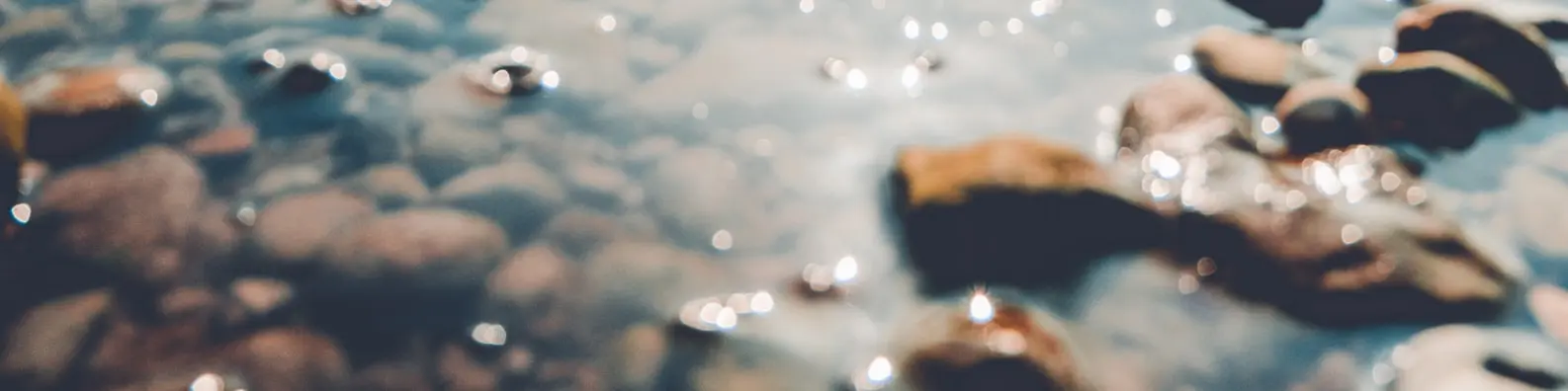 Stones By Shore Background