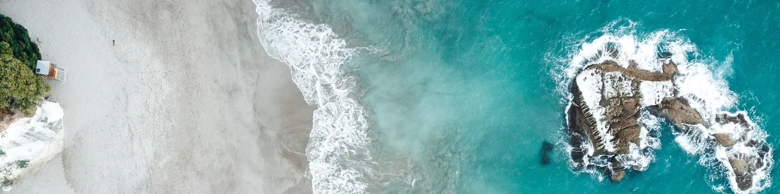 Sunlit Sandy Shore Background