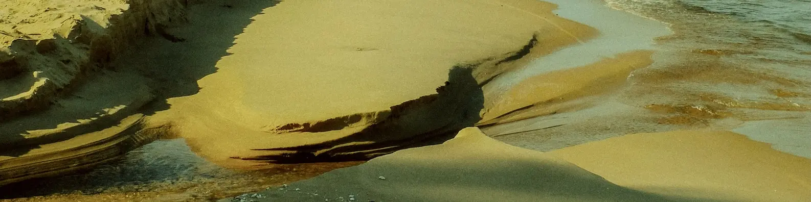 Waves Of Golden Sand Background