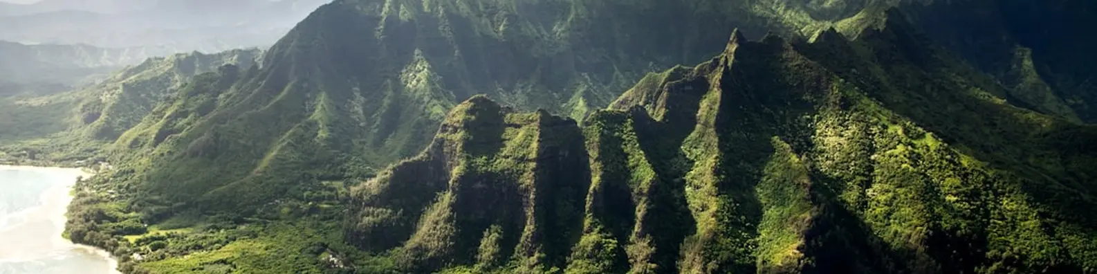 Green Mountain and Ocean Aerial Scene