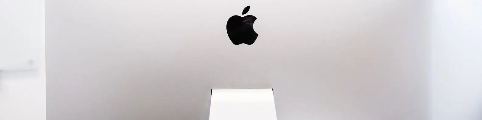 Old MacBook Back View on Desk